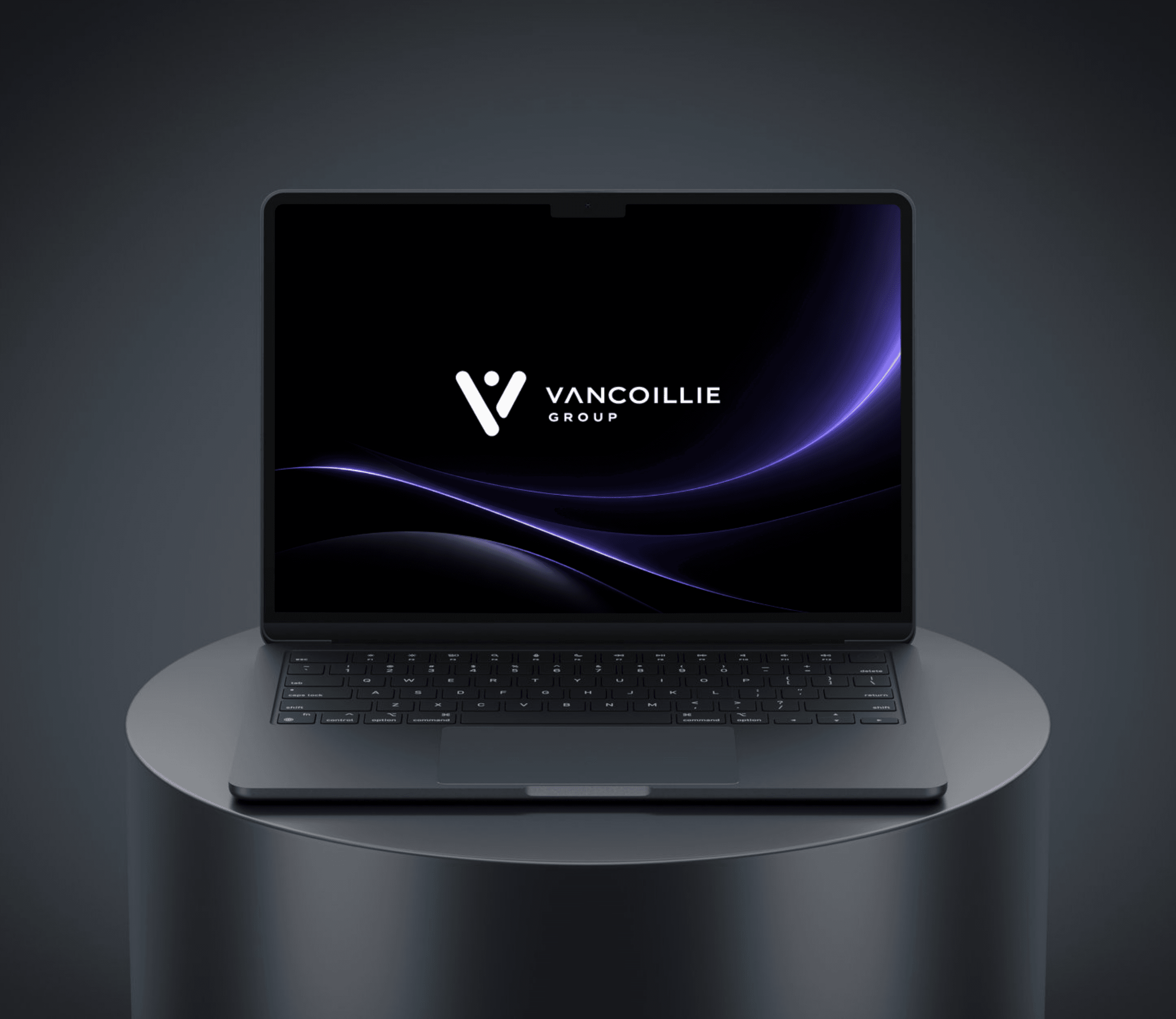 Een professionele website van Vancoillie Studio weergegeven op een laptop